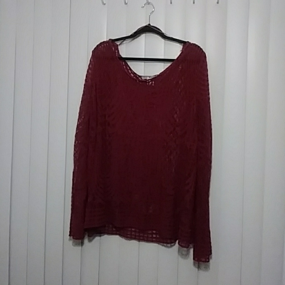 Burgandy see through blouse.